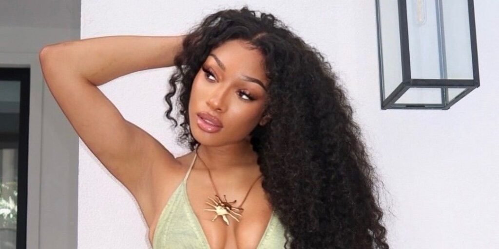 Megan Thee Stallion Tried a Fiery Red Hair Color and Bangs