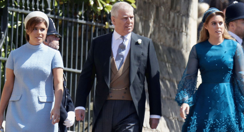 Princess Eugenie, Prince Andrew, and Princess Beatrice walk side by side towards St George's Chapel at Windsor Castle