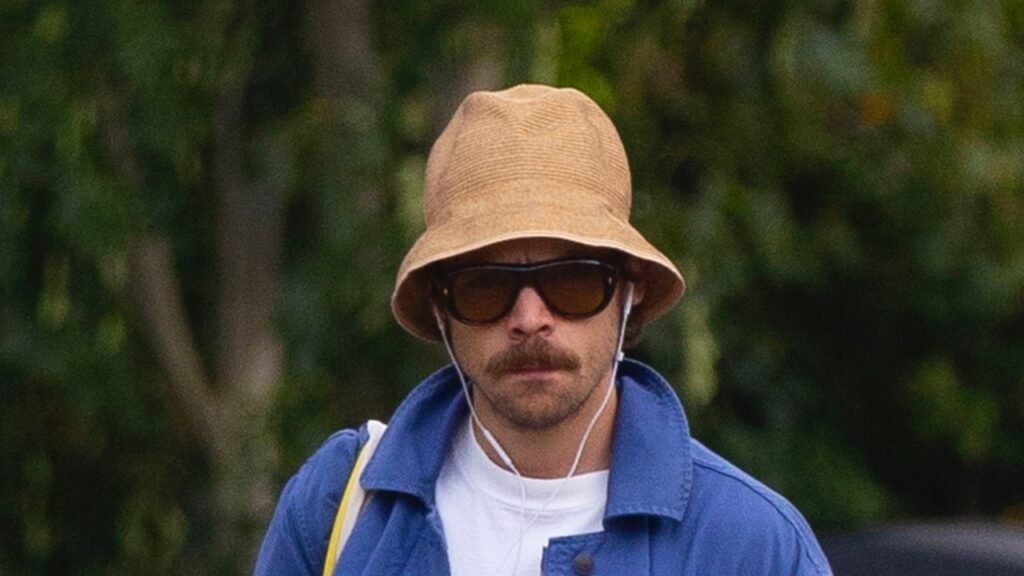 Harry Styles Embraces the Britpop Bucket Hat Harry Styles Embraces the Britpop Bucket Hat