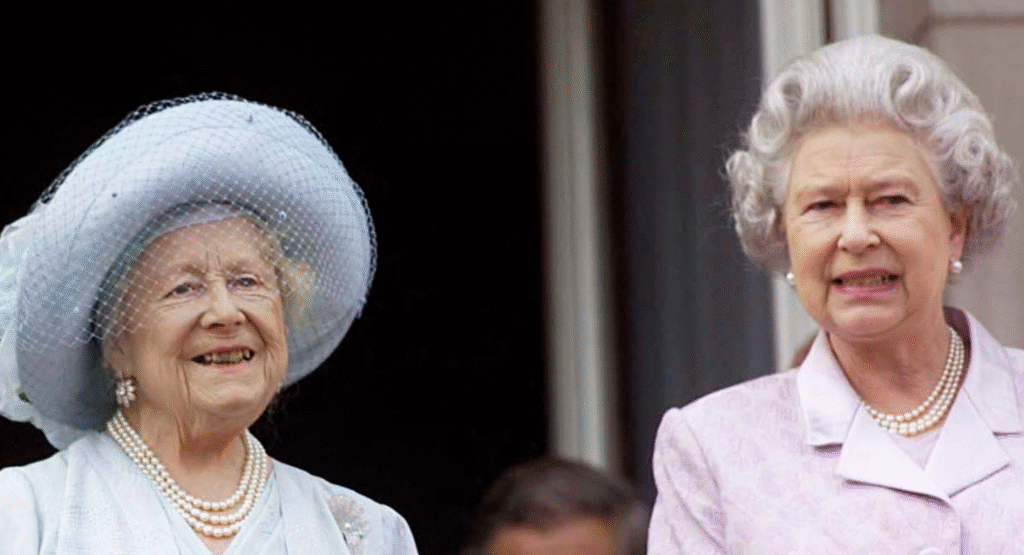 The Queen Mother wears a pale blue outfit and matching hat with a pearl necklace and brooches, and her daughter Queen Elizabeth II wears a pale purple outfit