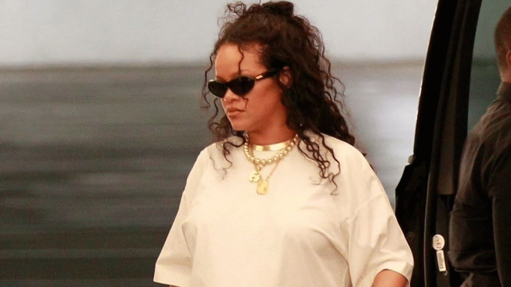 Rihanna Upgrades Her White T-Shirt With a Rare Fendi Baguette and Puma Flip-Flops