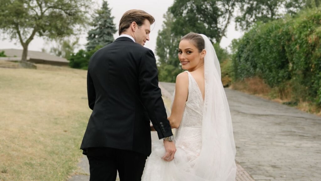 Singer Banks Wore a “Sexy and Romantic” Lace Vivienne Westwood Dress to Wed Lacrosse Star Drew Snider