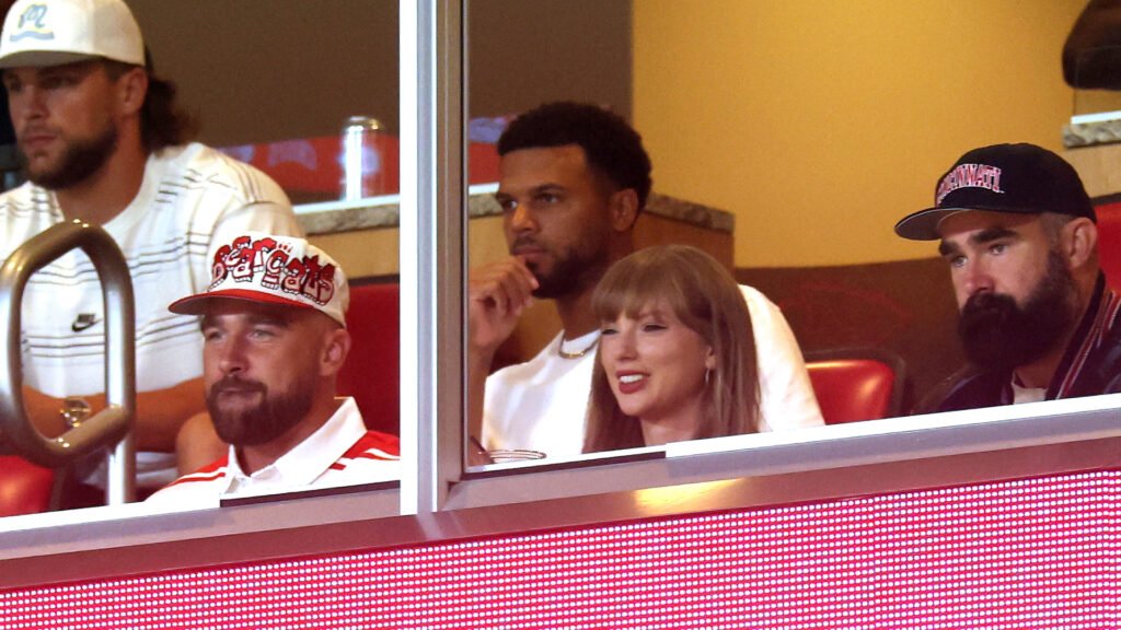 Taylor Swift Surprise Launches Her Bridal Style Era With “Something Blue” From Designers Taylor Swift attends a Cincinnati Bearcats game in Kansas City with Travis Kelce in her bridal style