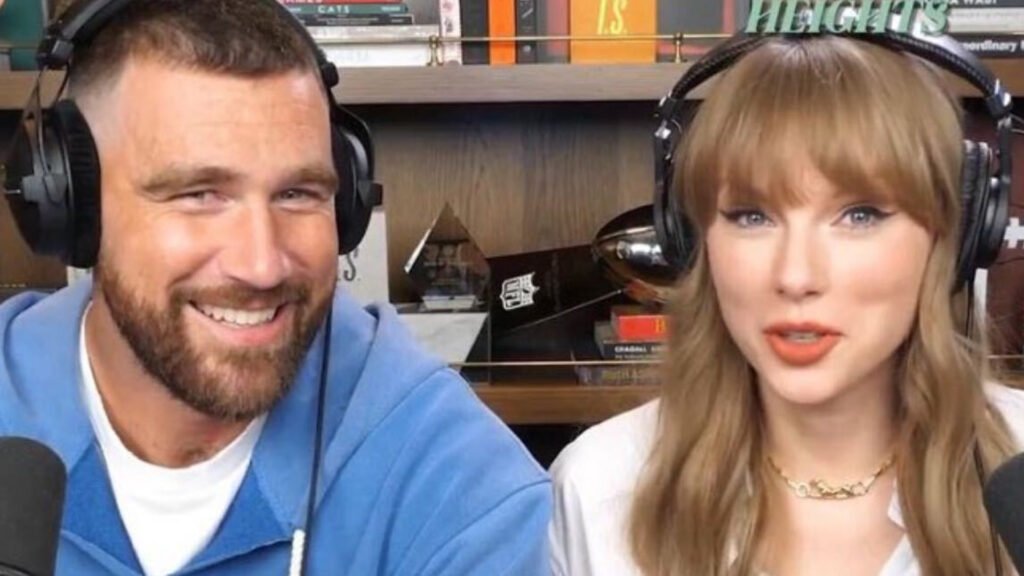 Taylor Swift Unveils 'The Life of a Showgirl' on Travis Kelce's Podcast in White Shirt & Cartier Necklace