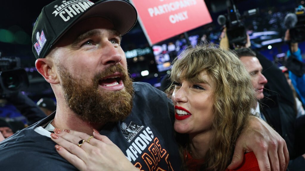 Travis Kelce and Taylor Swift celebrate the Kansas City Chiefs' win in the AFC Championship Game at M&amp;T Bank Stadium on January 28, 2024.