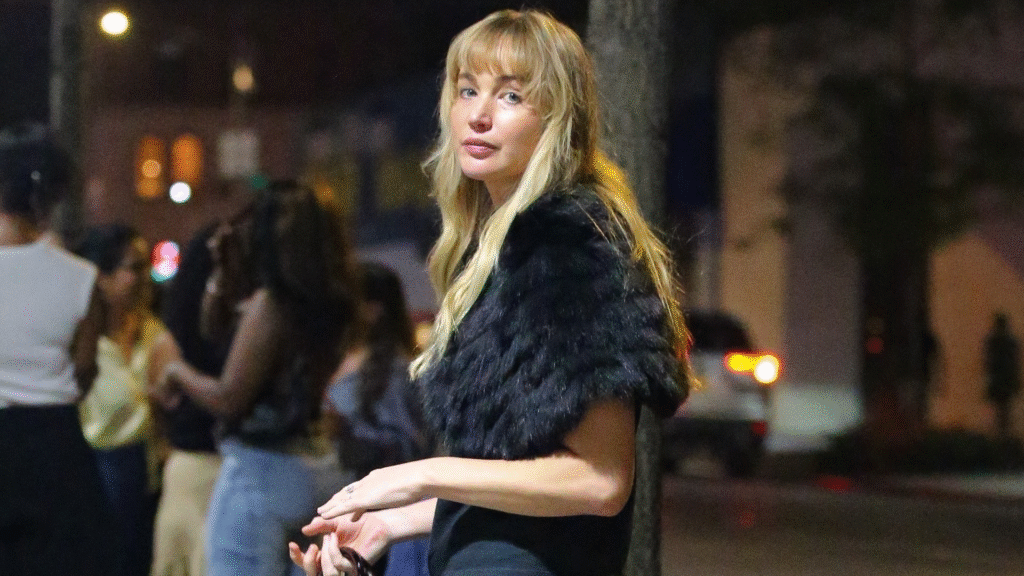 Jennifer Lawrence wore a fur shawl over her shoulders with La Ligne jeans and a five-figure The Row bag
