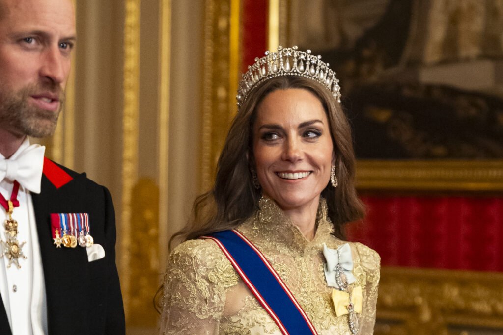 Kate Middleton wearing a tiara and gold gown