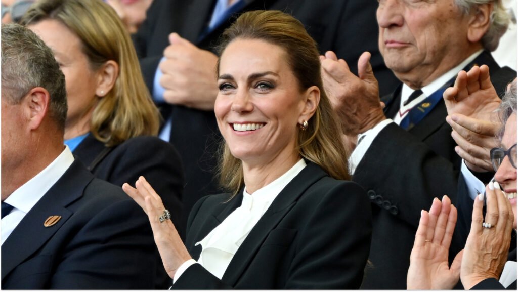Kate Middleton Pairs a Ruffled Blouse With Smart Black Suit Kate Middleton Pairs a Ruffled Blouse With Smart Black Suit