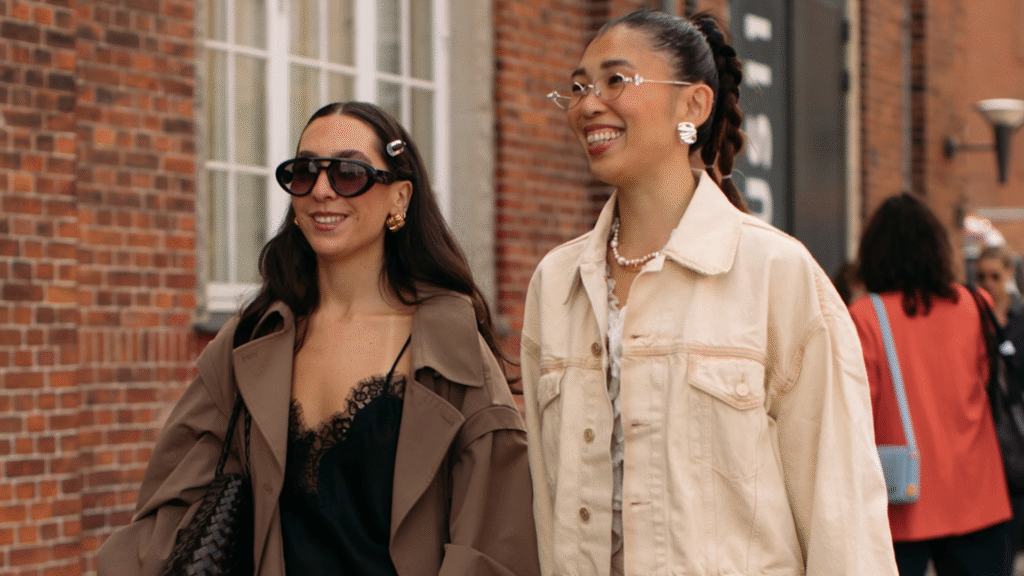 women wearing a trench coat and denim jacket