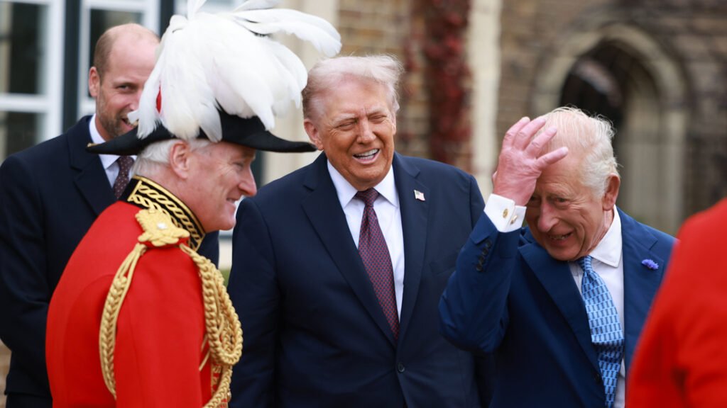 WINDSOR, ENGLAND - SEPTEMBER 17: US President Donald Trump (C) is welcomed to Windsor Castle by King Charles III (R) and Prince William, Prince of Wales on day two of the US President Donald Trump's second state visit to the UK on September 17, 2025 in Windsor, England. (Photo by Ian Vogler - WPA Pool/Getty Images)