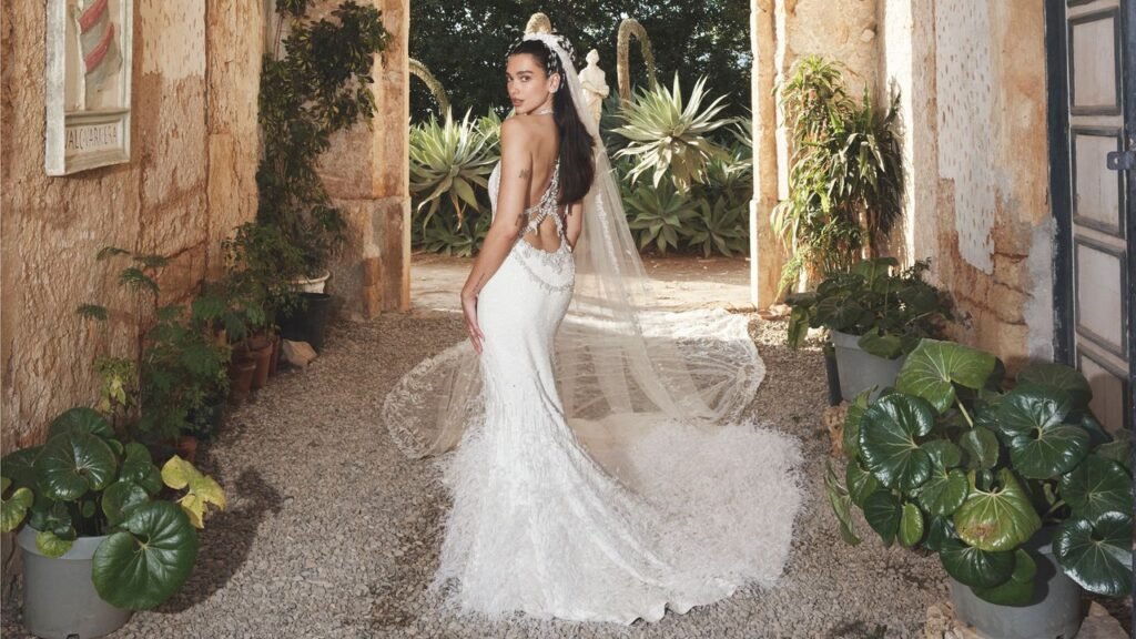 Versace! Chanel! Bottega! Schiaparelli! See Dua Lipa’s Wedding Looks All in One Place
