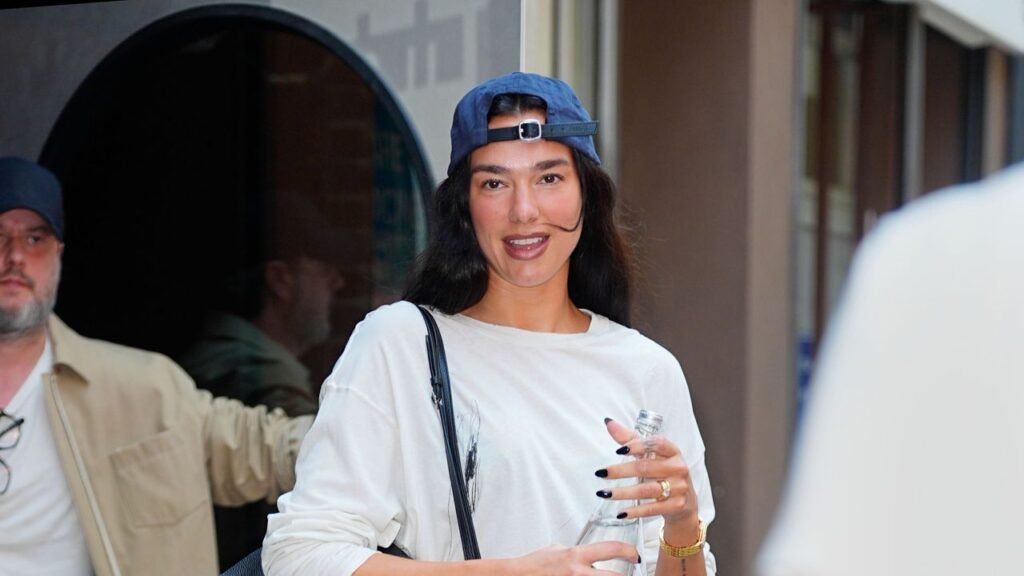 Dua Lipa Brings Her Vacation Staples Back To Work