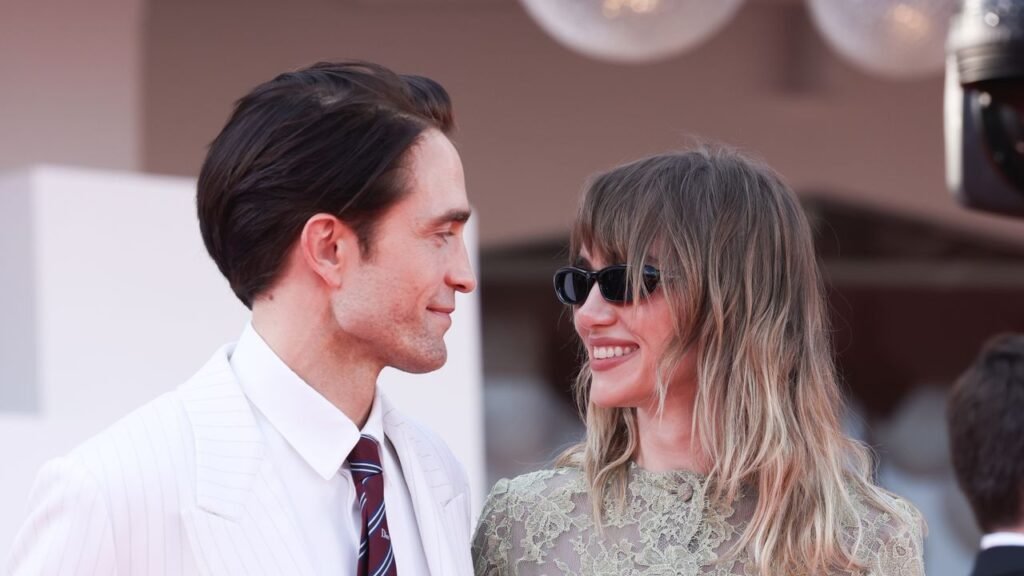 Robert Pattinson and Suki Waterhouse Get Romantic in Contrasting Couple Style at Venice Film Festival